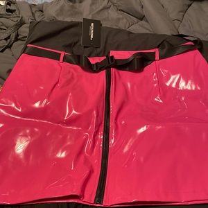 Pink plastic mini skirt